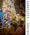 The magnificent limestone caverns of Thien Cung Cave illuminated by light (Halong Bay, Vietnam) 133754485