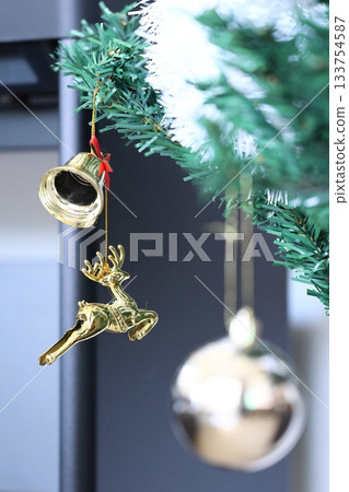 christmas bell and angel on the tree, closeup of photo christmas bell and angel on the tree, closeup of photo 133754587