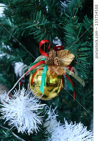 Christmas decoration on the christmas tree, closeup of photo. 133754588