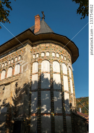 Medieval Princely Church stone facade and dark roof Piatra Neamt 133754682