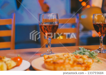 Joyful office Halloween party with coworkers in costumes, celebrating with drinks and laughter, fostering teamwork and festive spirit Joyful office Halloween party with coworkers in costumes, celebrating with drinks and laughter, fostering teamwork and festive spirit 133755684