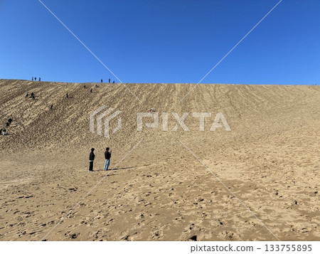 People climbing the Tottori Sand Dunes People climbing the Tottori Sand Dunes 133755895