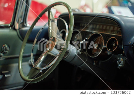 Vintage car interior with steering wheel and dashboard 133756062