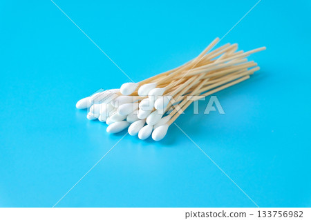 A swab clean health care top view,cotton bud on blue background. 133756982