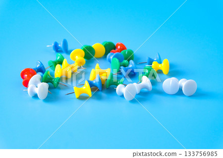 set of colorful push pins on color background. 133756985