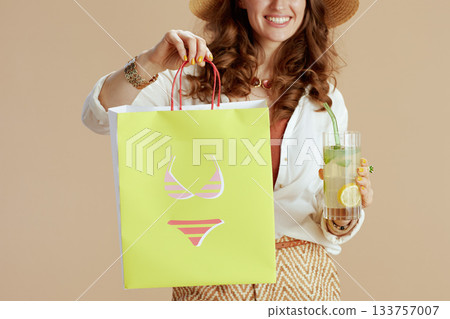 happy elegant housewife in blouse and shorts isolated on beige happy elegant housewife in blouse and shorts isolated on beige 133757007