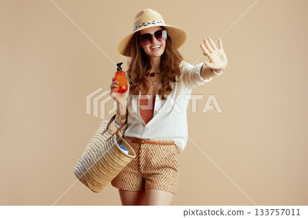 happy elegant woman in blouse and shorts 133757011