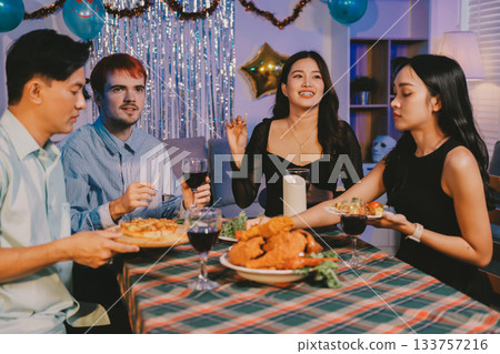 Diversity, dinner and group of people toast celebration together at party. Friends, happy and celebrate with food, wine and friendship for love, support and cheers champagne at business function Diversity, dinner and group of people toast celebration together at party. Friends, happy and celebrate with food, wine and friendship for love, support and cheers champagne at business function 133757216
