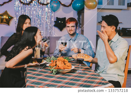 Diversity, dinner and group of people toast celebration together at party. Friends, happy and celebrate with food, wine and friendship for love, support and cheers champagne at business function 133757218