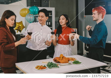Diversity, dinner and group of people toast celebration together at party. Friends, happy and celebrate with food, wine and friendship for love, support and cheers champagne at business function Diversity, dinner and group of people toast celebration together at party. Friends, happy and celebrate with food, wine and friendship for love, support and cheers champagne at business function 133757219