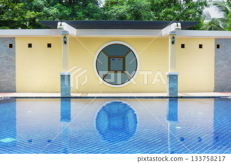 Modern Swimming Pool with Round Window and Minimal Architecture 133758217