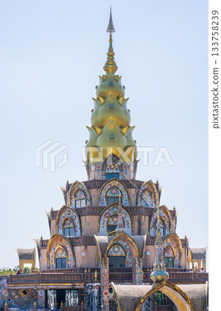 Ornate golden temple pagoda 133758239