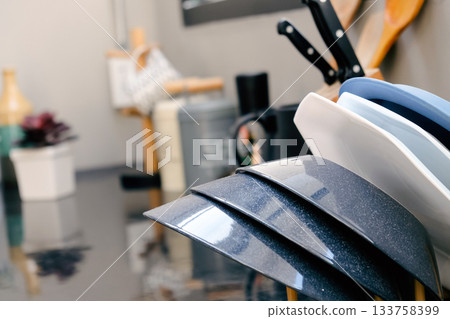 Detail image of Kitchen utensils on the table in a modern kitchen. 133758399