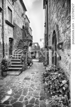 Picturesque Cobblestone Street in Ancient Civita di Bagnoregio, Italy 133760527