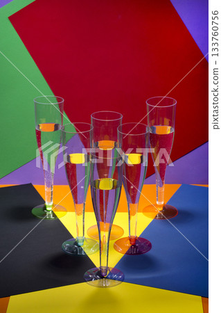 Still life with wine glasses on a colored background 133760756