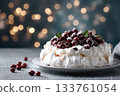 Pavlova Cake with berry cranberries with christmas lught background 133761054