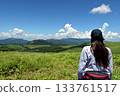 A woman looking at the view from the Venus Line in Nagano Prefecture 133761517