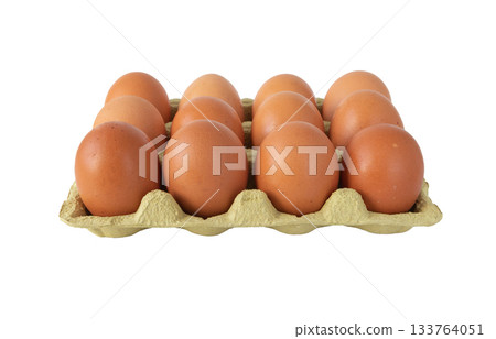 Carton tray with twelve brown eggs isolated on white Carton tray with twelve brown eggs isolated on white 133764051