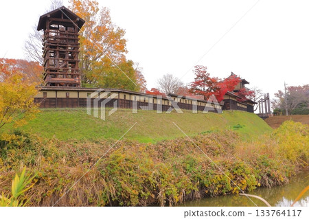 Sakai Castle walls and Iro Yagura surrounded by autumn leaves 133764117