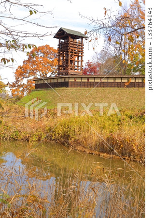 Sakai Castle walls and Iro Yagura surrounded by autumn leaves 133764143