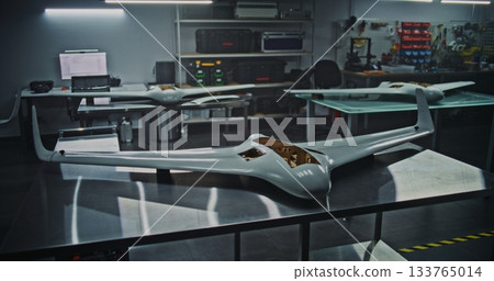 Large Unmanned Aerial Vehicle With Open Hatch Revealing Its Internal Electronic Components Large Unmanned Aerial Vehicle With Open Hatch Revealing Its Internal Electronic Components 133765014