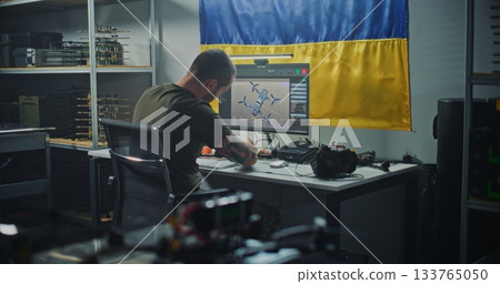 Ukrainian Engineer With Tattoos Checks Modern FPV Drone Using Compute Ukrainian Engineer With Tattoos Checks Modern FPV Drone Using Compute 133765050