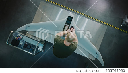 Worker Assembling Drones For National Security Worker Assembling Drones For National Security 133765060