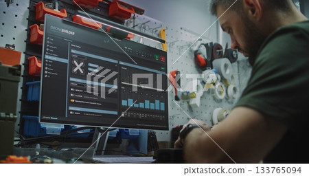 Engineer Programming FPV Drone Parameters on Computer Software 133765094