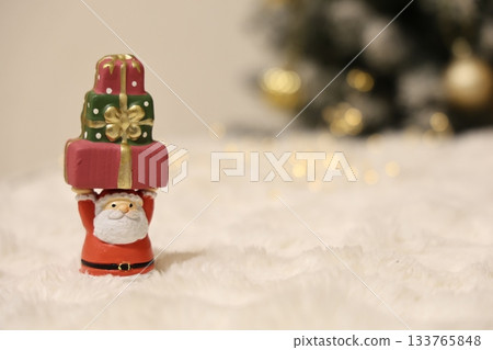 Christmas image: Santa Claus carrying presents Christmas image: Santa Claus carrying presents 133765848