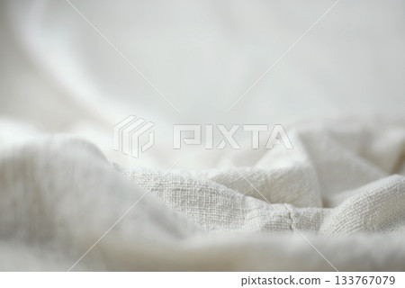 White cotton pile Hand-woven background, focus on the middle and blurry in the front and back 133767079
