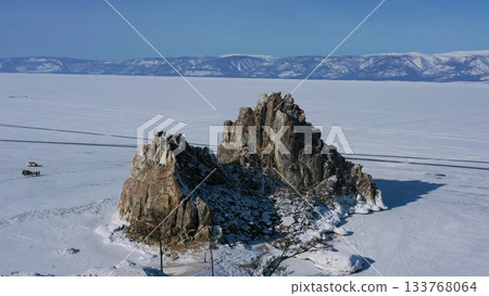Shaman rock in frozen lake Baikal Shaman rock in frozen lake Baikal 133768064
