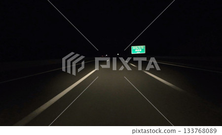 Driving on modern highway at night 133768089