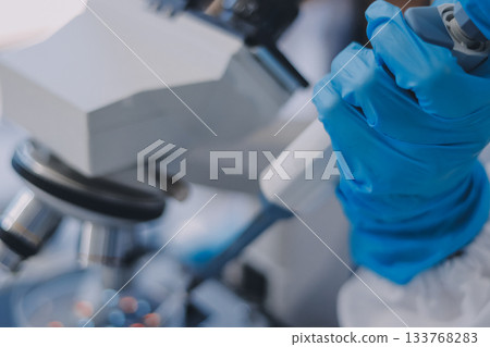 Portrait, science and happy woman on laptop in lab to research chemistry, test or innovation. Microscope, scientist and face of medical doctor in goggles for microbiology, healthcare or pharma study Portrait, science and happy woman on laptop in lab to research chemistry, test or innovation. Microscope, scientist and face of medical doctor in goggles for microbiology, healthcare or pharma study 133768283
