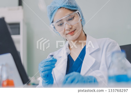 Portrait, science and happy woman on laptop in lab to research chemistry, test or innovation. Microscope, scientist and face of medical doctor in goggles for microbiology, healthcare or pharma study Portrait, science and happy woman on laptop in lab to research chemistry, test or innovation. Microscope, scientist and face of medical doctor in goggles for microbiology, healthcare or pharma study 133768297