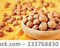 Bowl with whole walnuts ready to eat 133768830