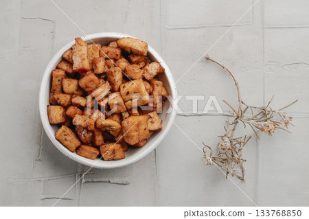high angle view of a bowl of marinated tofu cubes 133768850
