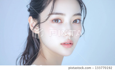 A captivating portrait of a young Japanese woman with natural makeup and clear, fair skin 133770192