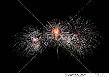 Many flashing colorful fireworks in event amazing with black background celebrate New Year. Many flashing colorful fireworks in event amazing with black background celebrate New Year. 133771935