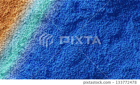 Wave ripples on a sandy beach made up of fine particles 133772478