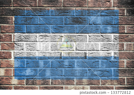 Nicaragua flag on old brick wall background 133772812
