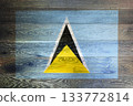 St. Lucia flag on rustic old wood surface background 133772814
