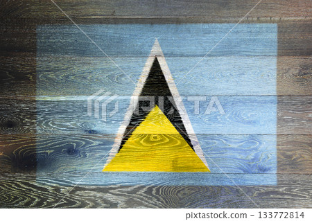 St. Lucia flag on rustic old wood surface background St. Lucia flag on rustic old wood surface background 133772814