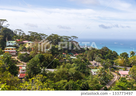 Mahe island, Seychelles. A tropical island setting featuring a vibrant coastline, 133773497