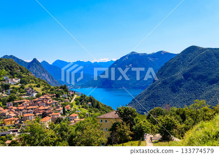 Scenic view of lake Lugano from Monte Bre mountain in Ticino canton, Switzerland 133774579