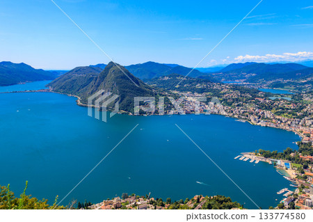 Scenic view of lake Lugano from Monte Bre mountain in Ticino canton, Switzerland Scenic view of lake Lugano from Monte Bre mountain in Ticino canton, Switzerland 133774580