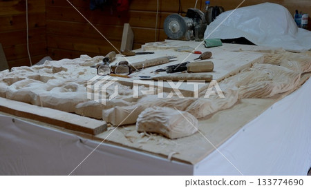 Revitalizing vintage upholstered furniture using traditional crafts and equipment, Rejuvenation of antique furniture pieces through careful restoration employing tools and fabric techniques 133774690