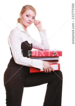 Paperwork. Businesswoman carrying stack of documents 133775500