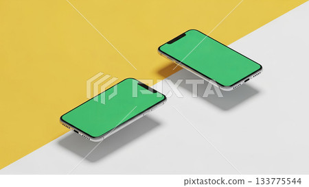 Two floating smartphones with green screen mockup on yellow and white background Two floating smartphones with green screen mockup on yellow and white background 133775544