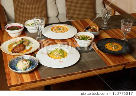 Indulge in a Gourmet Dining Experience featuring an Exquisite and Lavish Feast for All Indulge in a Gourmet Dining Experience featuring an Exquisite and Lavish Feast for All 133775817