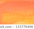 Soft orange and yellow watercolor background material with a paper texture 133776406